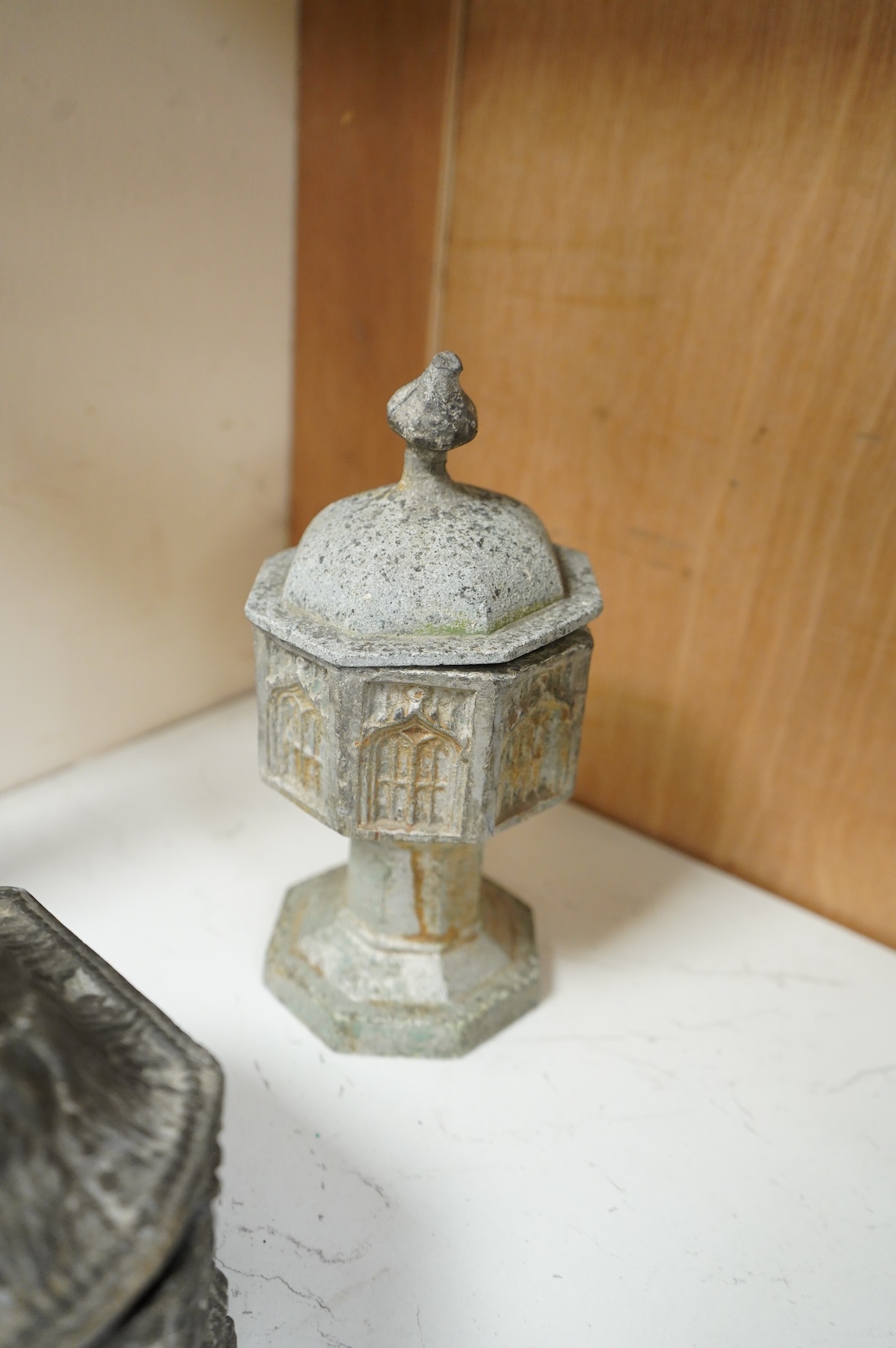 A collection of ten early 19th century lead tobacco boxes, one in the form of a goat’s head, tallest 20cm